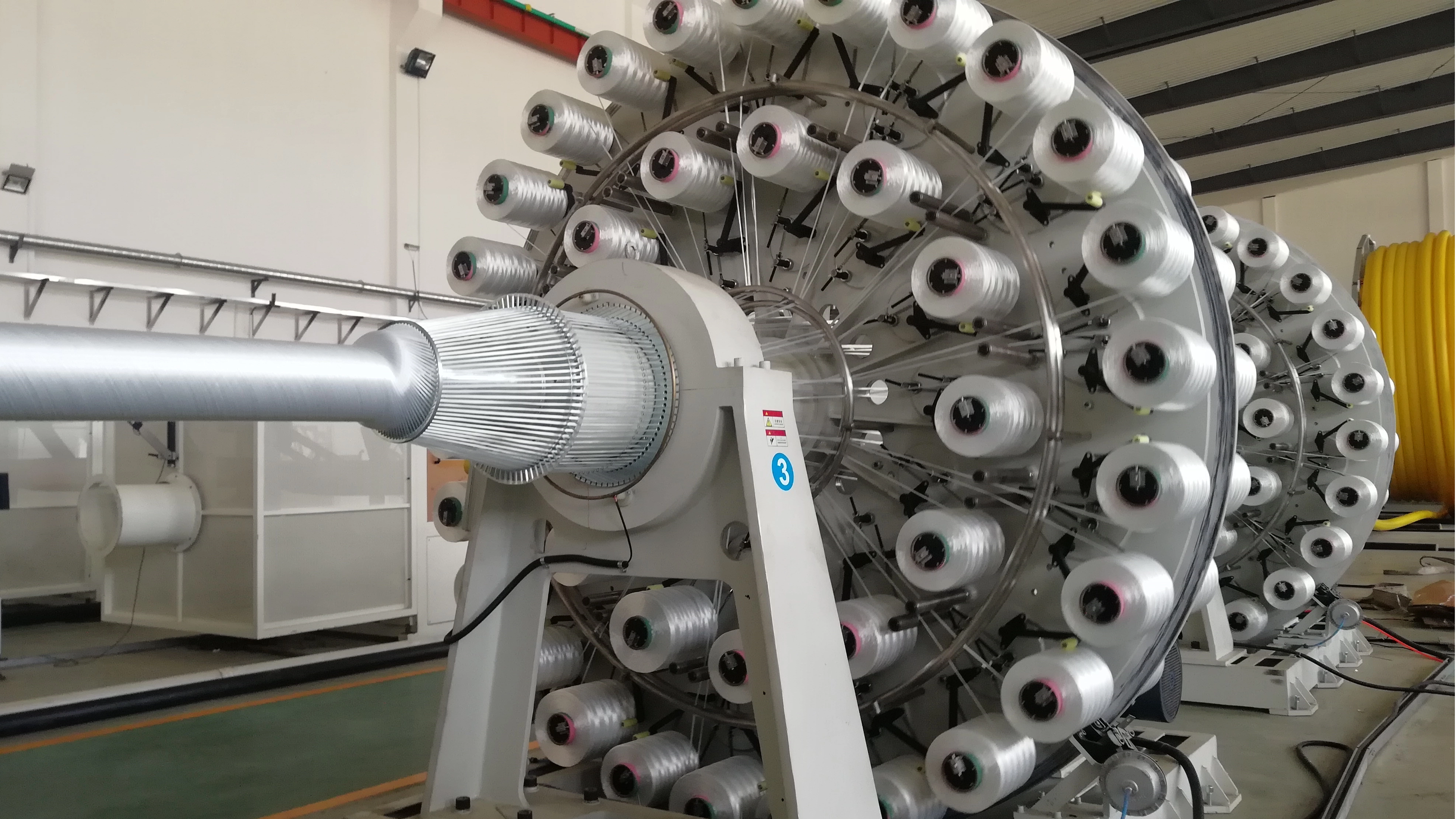 吉玛格RTP管材生产设备非金属绳缠绕工位特写